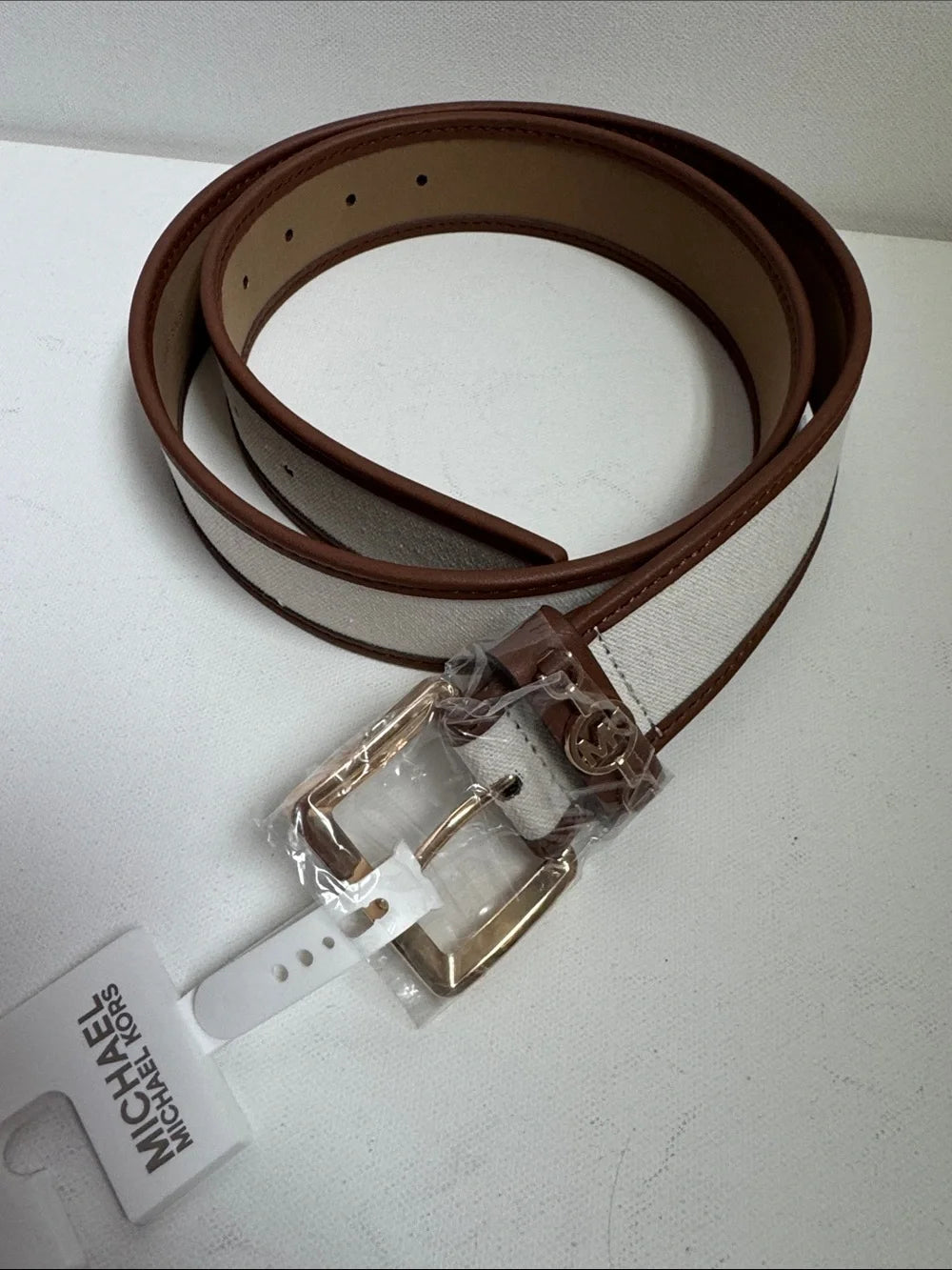 Michael Kors Ladies Belt-Cream Canvas & Brown Leather with Gold Buckle.